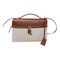 THE SIGNATURE SATCHEL